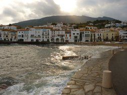 city on seacoast at sunset, spain, cadaqués