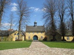 historic gatehouse in park, germany, mecklenburg