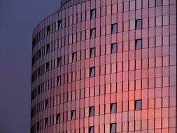 night view of the glass facade of the building