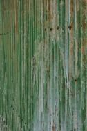 green corrugated metal wall