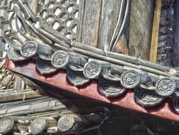 stone carving on the house close up