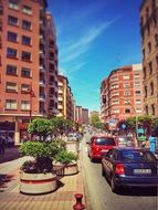 cityscape of high buildings on a street