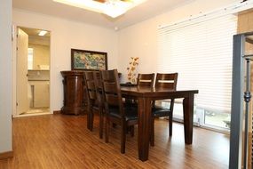 Wooden dining table in a family house