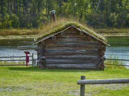 wooden dugout by the water