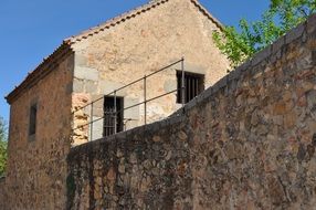 stone facade of a village house