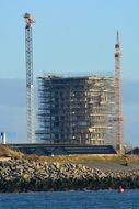 construction of a building with a crane
