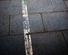 white stripe on the sidewalk