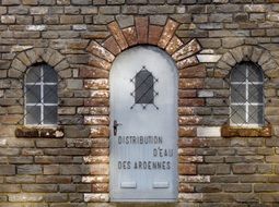 metal doors in a brick building