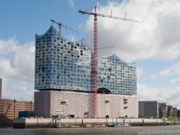 construction cranes at philharmonic hall, germany, hamburg