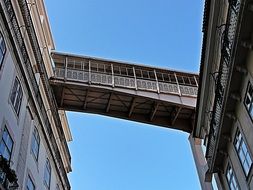 bridge between buildings in portugal