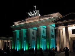 Brandenburg Gate in colorful night illumination