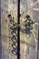 Iron lock on a wooden door