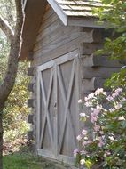 landscape of wooden barn in the garden
