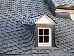 Photo of dormer window on a roof