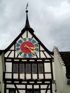 Colorful tower with clock face in Switzerland