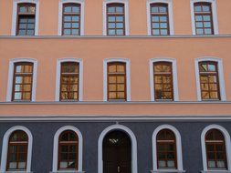 windows with mirror reflection on the facade of the building