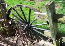 Landscape of old wheel in a garden