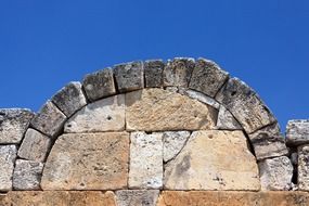 stone antique arch on a building