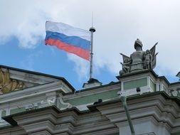Photo of Russian flag is on a ancient building