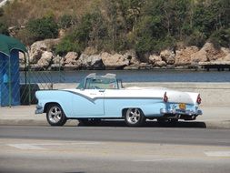 blue retro car outdoors in Havana, Cuba