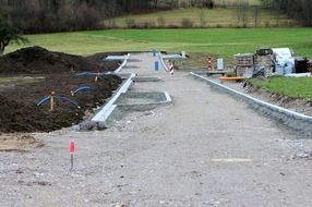 Road near the new building construction