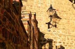 lanterns on antique brick wall