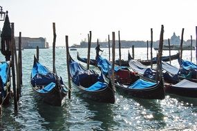 parking of gondolas on the water in venice