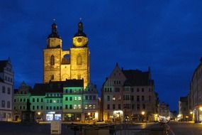 illuminated church with the lights at night in Wittenberg