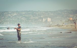 Man is fishing in the water