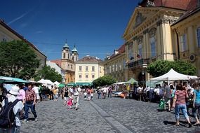 tourists on the main street and town hall square