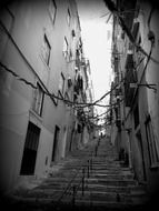 stairs up in long old alley, portugal, lisbon