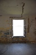 window in an abandoned building