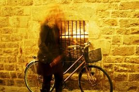 woman with bicycle in Barcelona