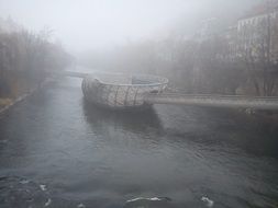 blurred photo of a boat on a river