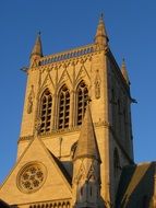 church with spiers against the blue sky