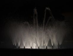 black and white photo of a fountain in Spain