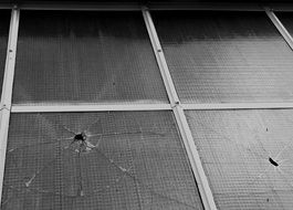 cracked glass in the window frame