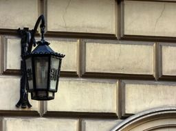 street lamp on a brick wall