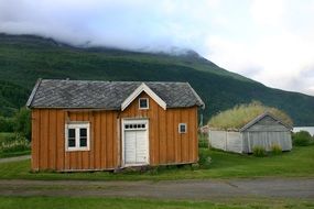 house and fog mountain