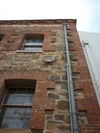 facade of a red stone urban building