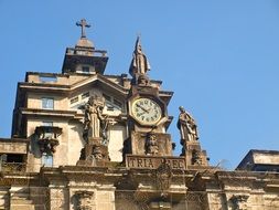 university of santo tomas, clock at top of building, philippines