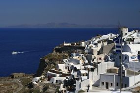 low-rise white houses in Santorini