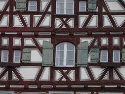 Fachwerkhaus truss with shutters on it