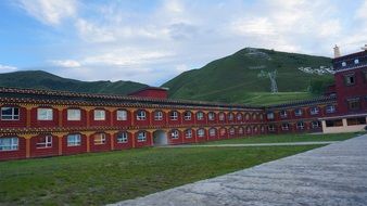 red walls of a temple in Asia