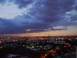 view of the night city under the evening sky