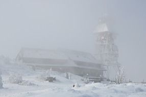 Winter mountains in the fog