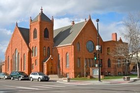 red church methodist building on a clear day