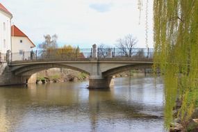 romantic bridge over the river in wolfsberg, austria