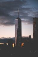 World trade center in New York against a backdrop of thunderclouds