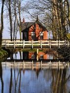 bridge and brick house in countryside of Netherlands